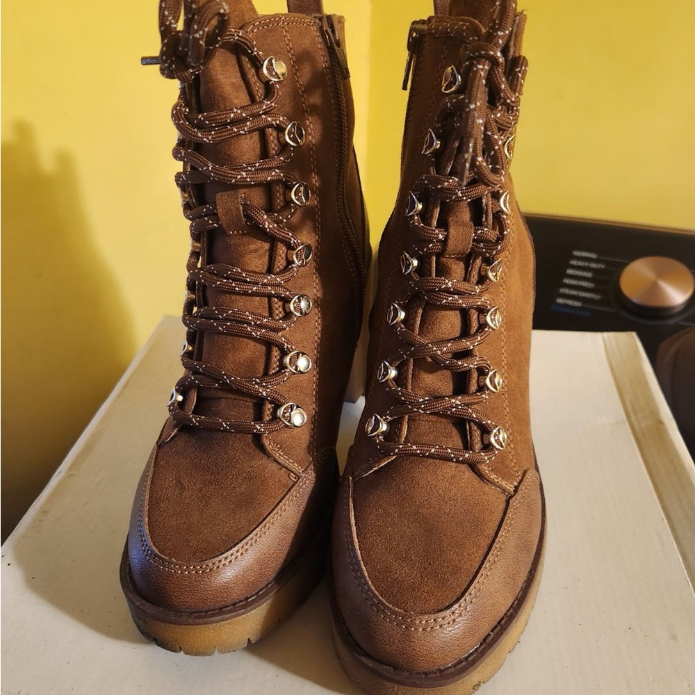 Brown boots with heel never used still in the box